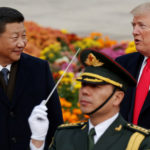 FILE PHOTO: U.S. President Donald Trump takes part in a welcoming ceremony with China’s President Xi Jinping at the Great Hall of the People in Beijing